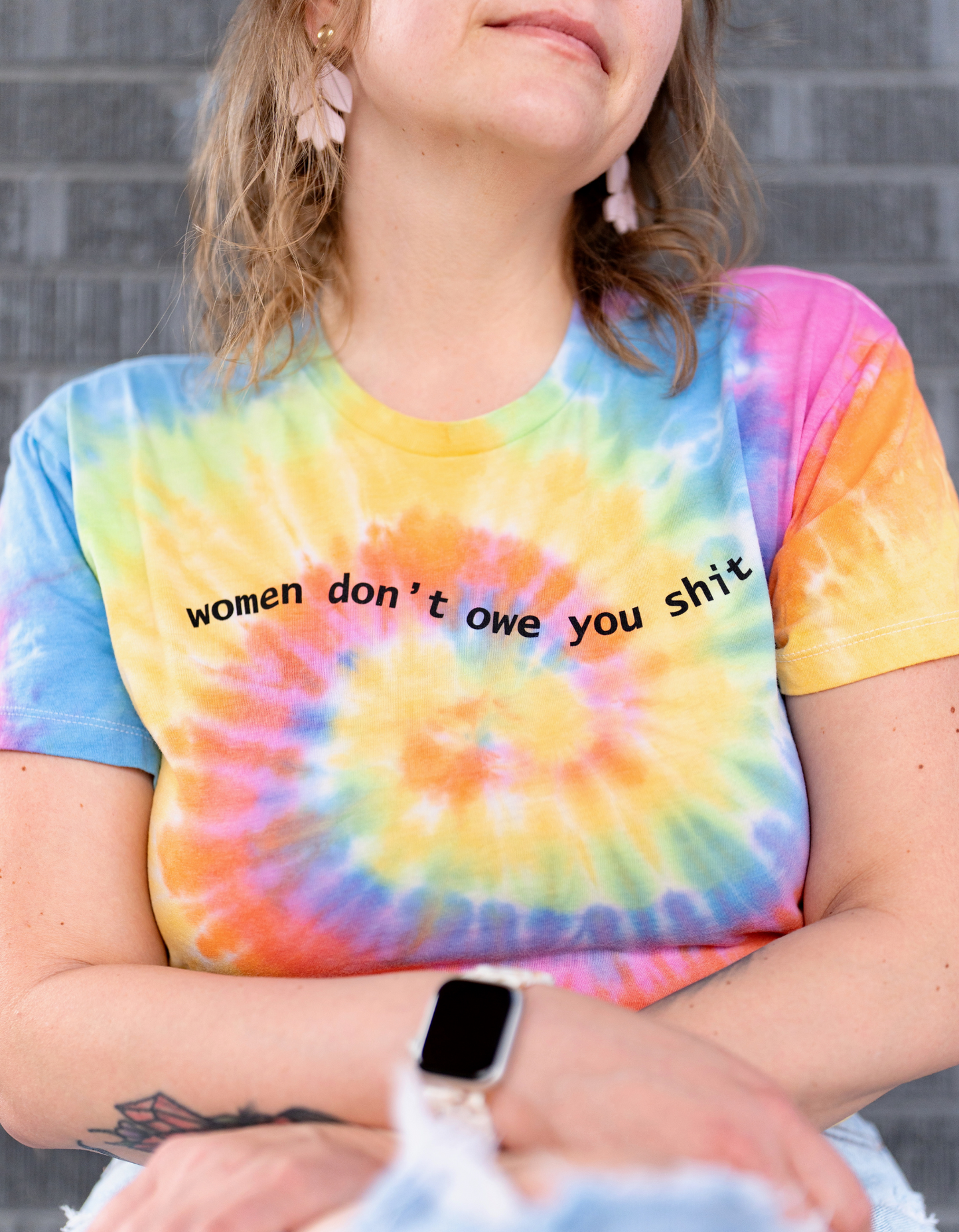 WOMEN DON'T OWE YOU SHIT on Tie Dye T-Shirt